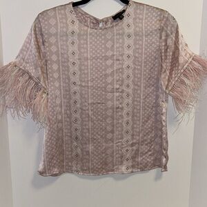 ONT WELFTH BRAND… PINK CREME BLOUSE WITH FEATHERS ON THE SLEEVES